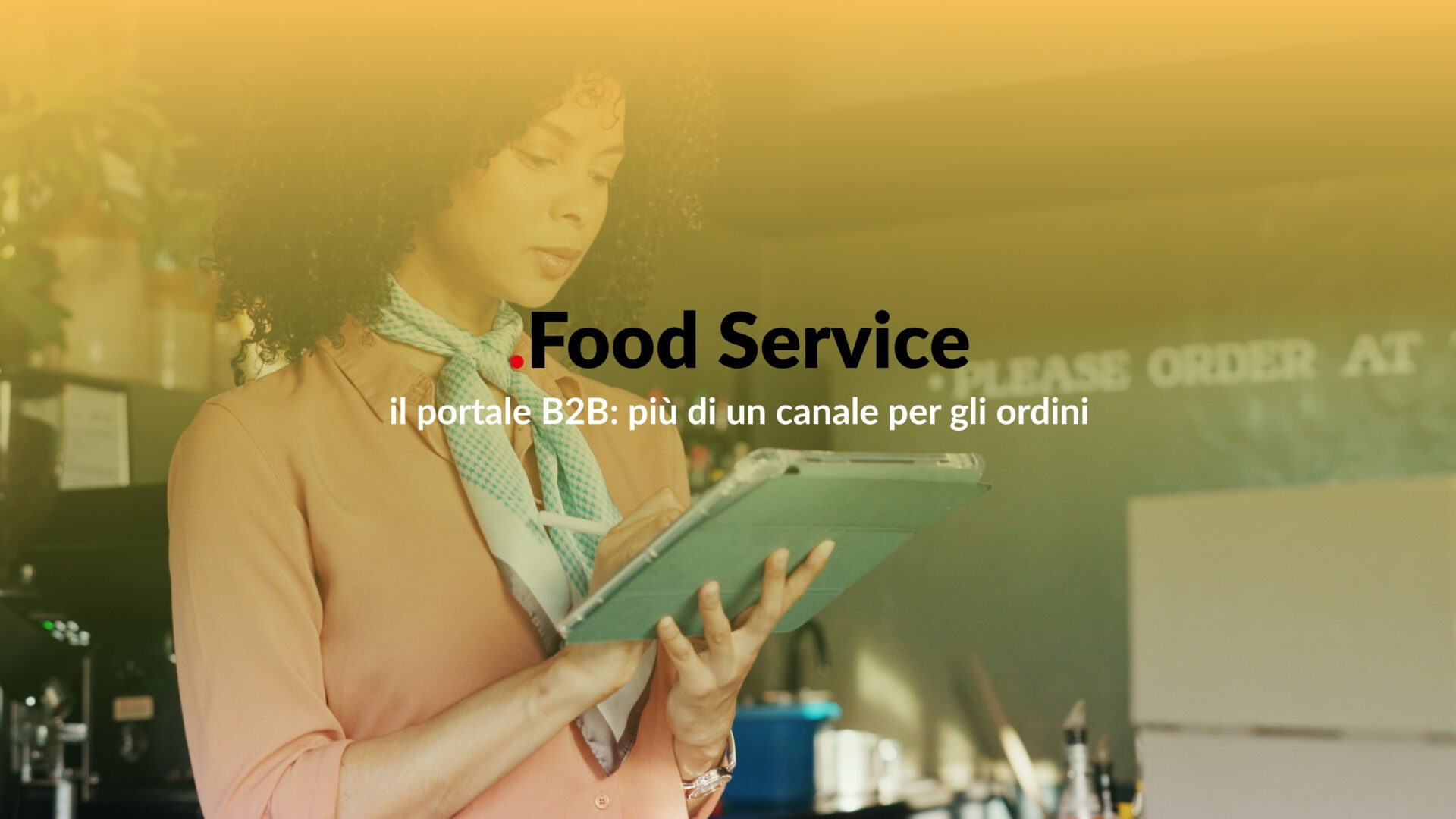 Professionista del Food Service utilizza un tablet per gestire ordini e servizi tramite portale B2B